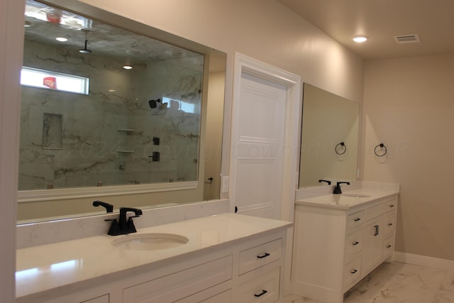 8104 Miami Ave, Amarillo, TX 79118 - bathroom with marble look tile flooring, a marble finish shower, vanity, and baseboards
