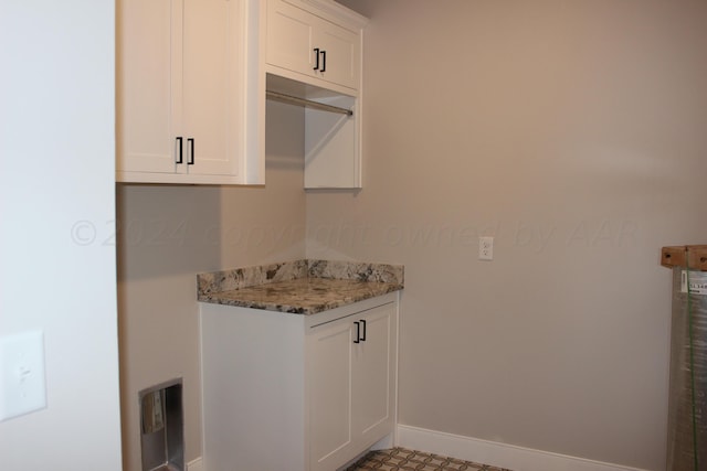 8104 Miami Ave, Amarillo, TX 79118 - laundry area with baseboards
