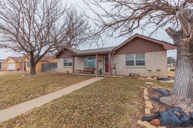 ranch-style house with a front yard