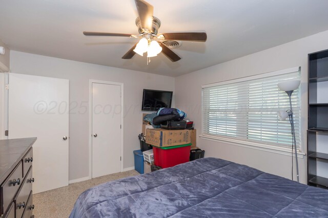 bedroom featuring ceiling fan
