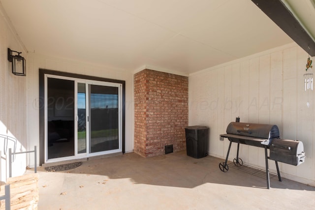 view of patio with a grill