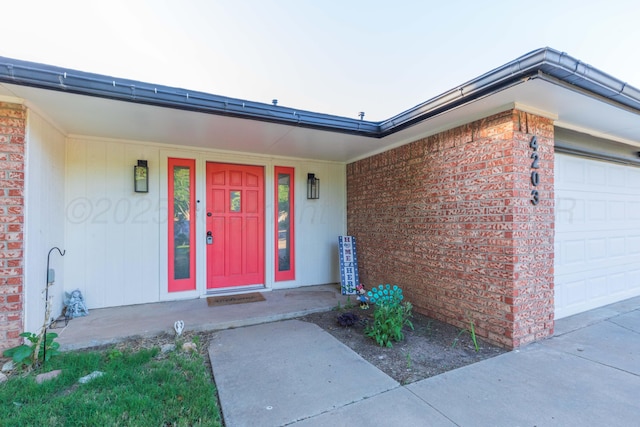 property entrance with brick siding