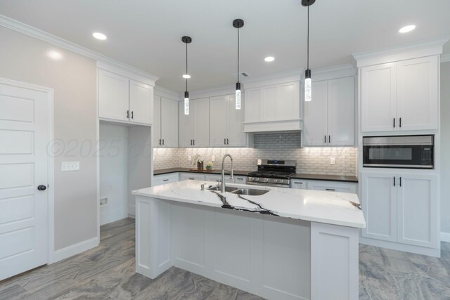2807 Tampa Bay Ave, Amarillo, TX 79118 - kitchen featuring stainless steel appliances, white cabinetry, backsplash, a sink, and recessed lighting