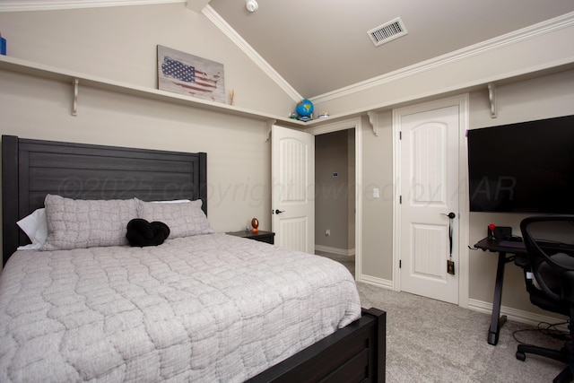 bedroom featuring light carpet, lofted ceiling, and baseboards