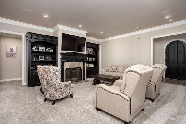 living area with a premium fireplace, crown molding, light carpet, recessed lighting, and baseboards