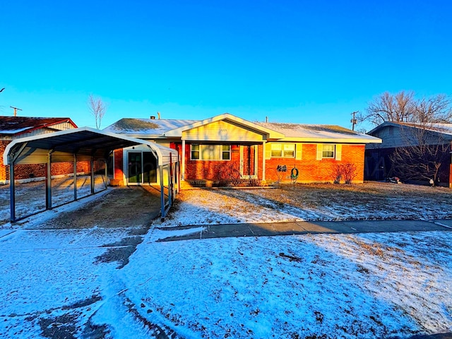 view of front of house with a carport