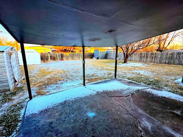 view of patio with a shed