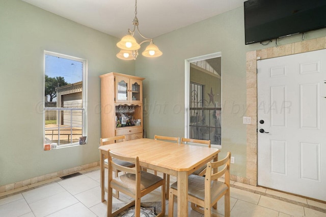 1007 N Jackson St, Amarillo, TX 79107 - dining space with light tile patterned floors and plenty of natural light