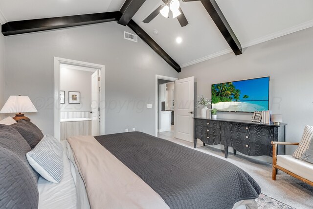 1600 NE 6th St, Dumas, TX 79029 - bedroom with visible vents, a ceiling fan, connected bathroom, and vaulted ceiling with beams