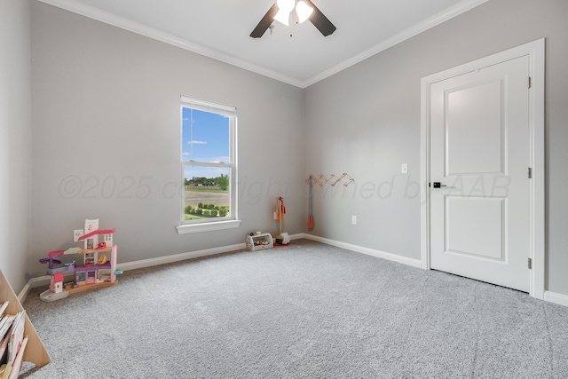 1600 NE 6th St, Dumas, TX 79029 - playroom with carpet floors, ornamental molding, baseboards, and ceiling fan