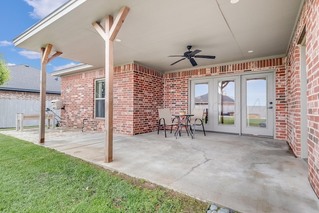1600 NE 6th St, Dumas, TX 79029 - view of patio / terrace featuring french doors, fence, and a ceiling fan