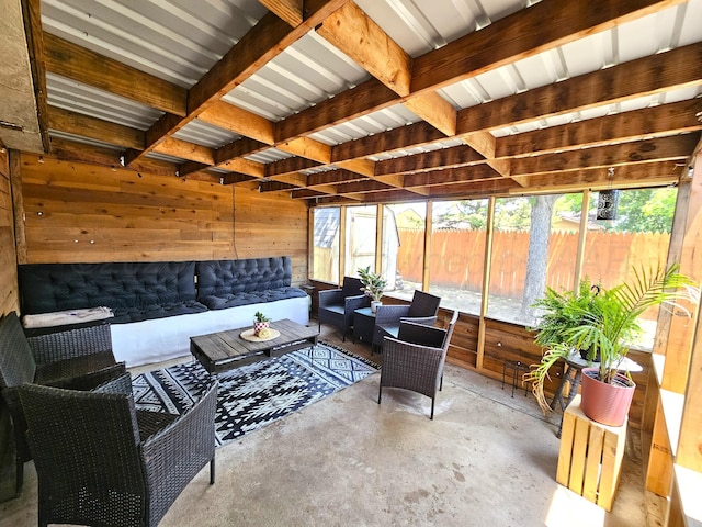 522 N Red Deer St, Pampa, TX 79065 - sunroom featuring healthy amount of natural light, beam ceiling, and an outdoor hangout area