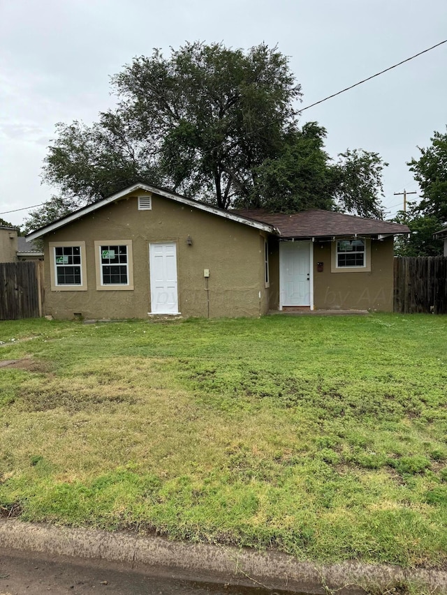 view of front of house with a front lawn