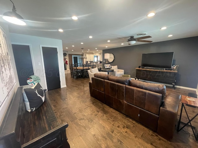 1711 N Holly Ln, Pampa, TX 79065 - living room featuring ceiling fan, dark wood-type flooring, recessed lighting, and baseboards