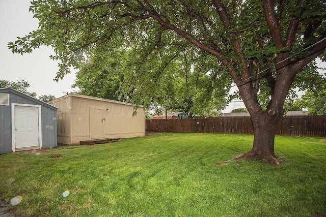 3122 Nebraska St, Amarillo, TX 79106 - fenced backyard featuring a storage unit