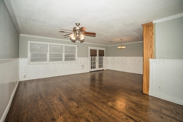 3122 Nebraska St, Amarillo, TX 79106 - unfurnished room featuring a ceiling fan, wainscoting, wood finished floors, a chandelier, and crown molding