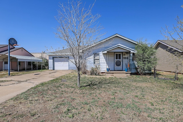 506 E 5th St, Sunray, TX 79086 - ranch-style home with concrete driveway and a garage