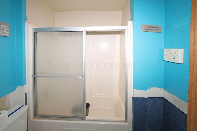 506 E 5th St, Sunray, TX 79086 - bathroom with an enclosed shower and toilet