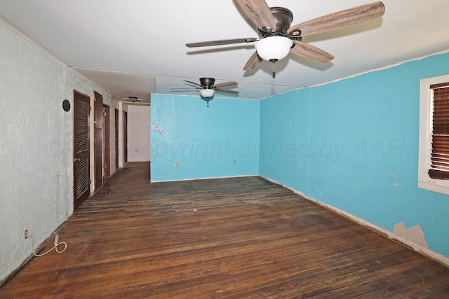 506 E 5th St, Sunray, TX 79086 - unfurnished room with a textured wall, hardwood / wood-style flooring, and ceiling fan