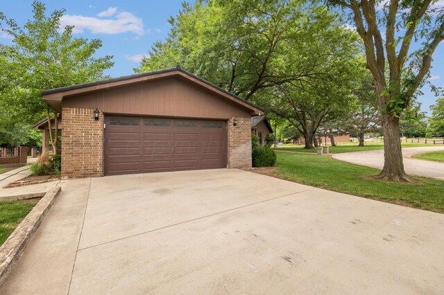 300 W 11th St, Wheeler, TX 79096 - view of front of property with brick siding, a front lawn, and driveway