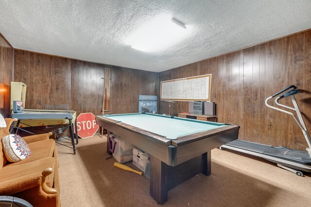 300 W 11th St, Wheeler, TX 79096 - recreation room featuring a textured ceiling, carpet floors, billiards, and wooden walls