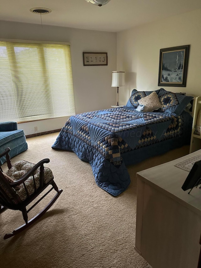 bedroom featuring carpet