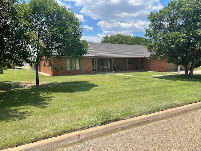 ranch-style home with a front lawn