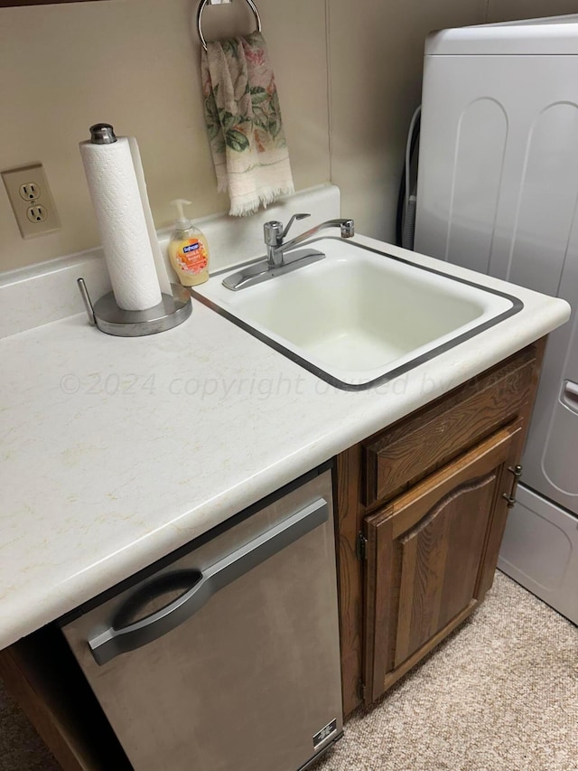 interior details featuring stainless steel dishwasher, carpet floors, and sink