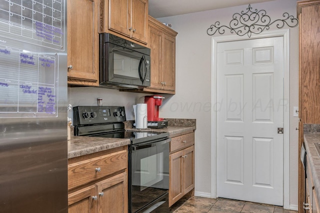7209 Explorer Trl, Amarillo, TX 79118 - kitchen featuring black appliances and brown cabinetry