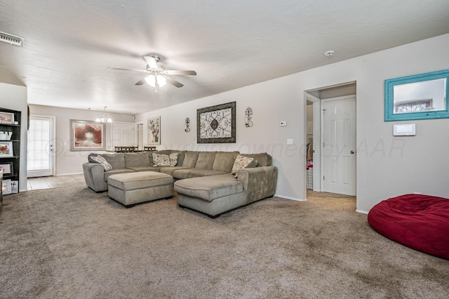 7209 Explorer Trl, Amarillo, TX 79118 - carpeted living area with ceiling fan, a chandelier, and baseboards