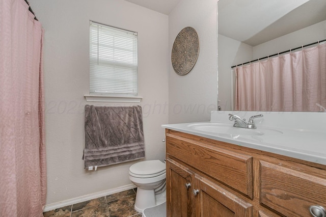 7209 Explorer Trl, Amarillo, TX 79118 - full bathroom featuring baseboards, toilet, and vanity
