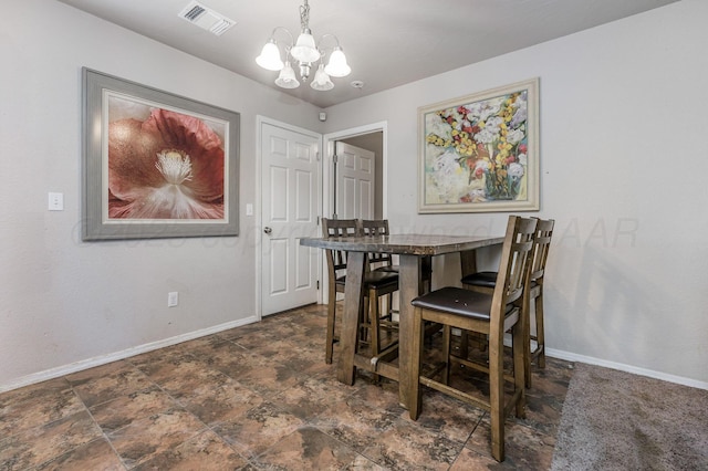 7209 Explorer Trl, Amarillo, TX 79118 - dining space featuring a chandelier and baseboards