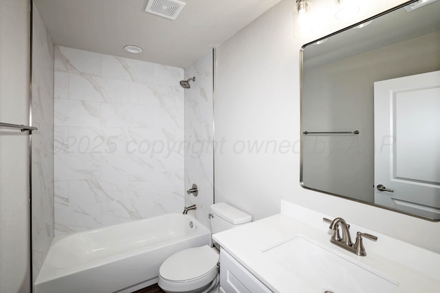 full bathroom featuring toilet, visible vents, shower / bathing tub combination, and vanity