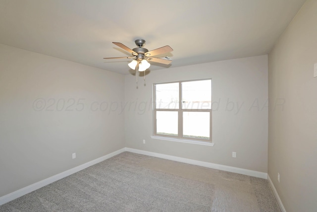 empty room with baseboards, a ceiling fan, and light carpet