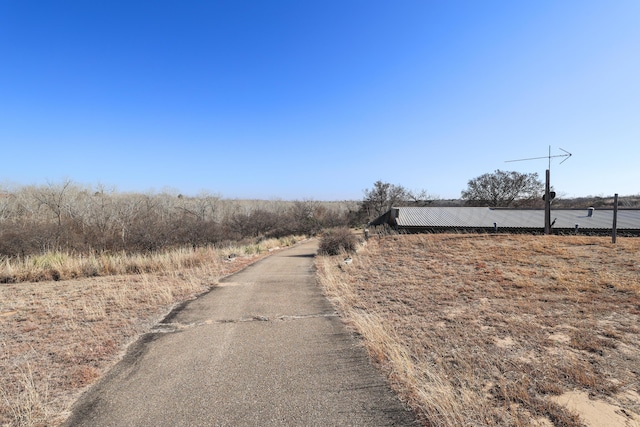 view of road with a rural view