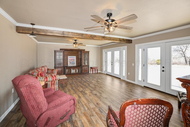 living room with ornamental molding, hardwood / wood-style floors, and french doors