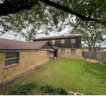 1035 N Duncan St, Pampa, TX 79065 - rear view of house with brick siding