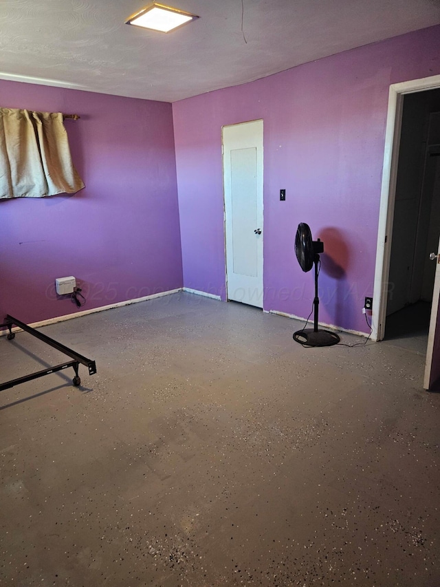interior space featuring speckled floor