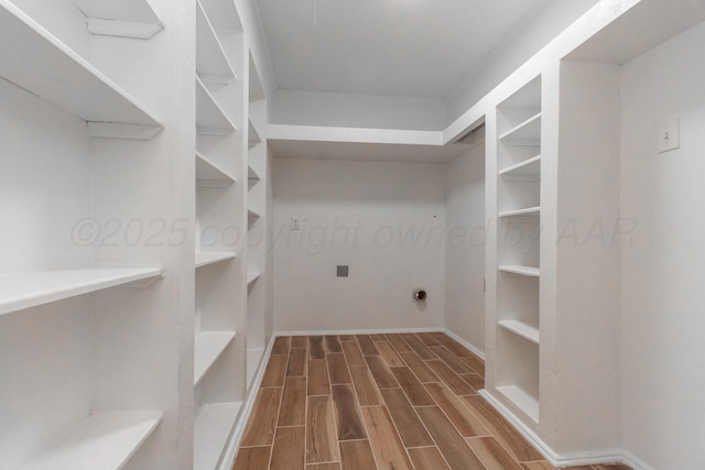 4808 SW 57th Ave, Amarillo, TX 79109 - walk in closet featuring wood finished floors