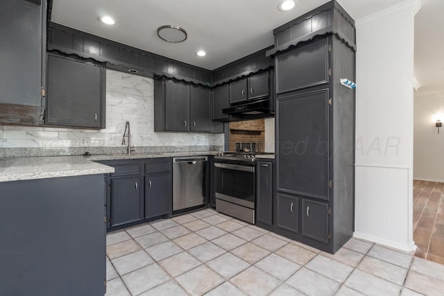 4808 SW 57th Ave, Amarillo, TX 79109 - kitchen featuring appliances with stainless steel finishes, crown molding, decorative backsplash, light countertops, and under cabinet range hood