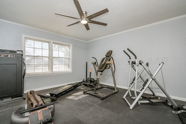 workout room with a ceiling fan, crown molding, and baseboards