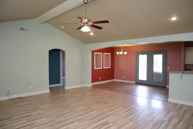 9807 Will Ave, Amarillo, TX 79119 - unfurnished living room with arched walkways, a ceiling fan, a chandelier, light wood finished floors, and recessed lighting
