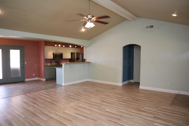 9807 Will Ave, Amarillo, TX 79119 - unfurnished living room featuring arched walkways, light wood finished floors, a ceiling fan, and recessed lighting