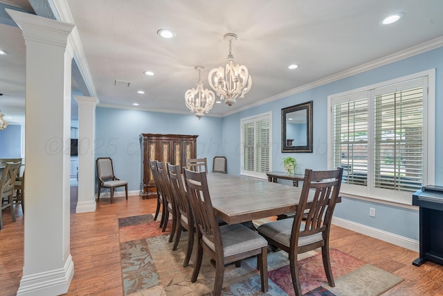 3523 Rutson Dr, Amarillo, TX 79109 - dining area with a chandelier, recessed lighting, light wood finished floors, ornamental molding, and decorative columns