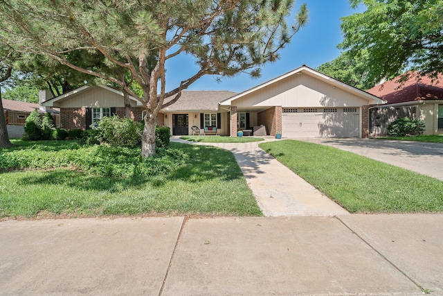 3523 Rutson Dr, Amarillo, TX 79109 - single story home with brick siding, a garage, driveway, a front lawn, and covered porch