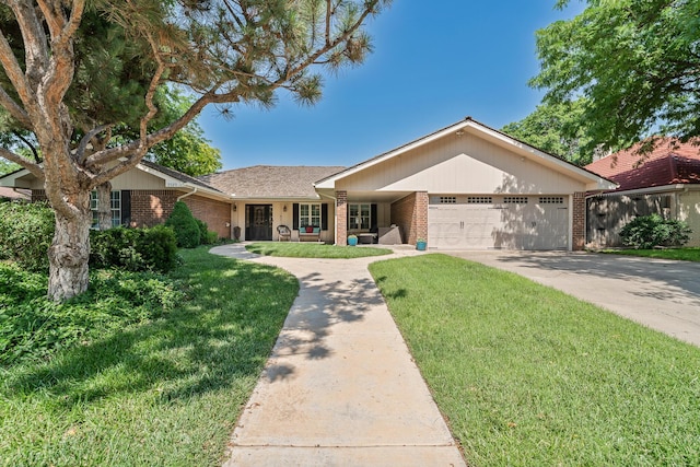 3523 Rutson Dr, Amarillo, TX 79109 - single story home featuring brick siding, a garage, a front yard, and concrete driveway