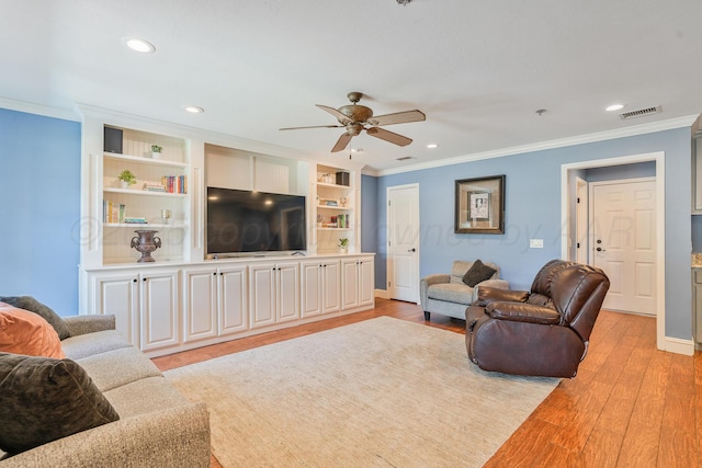 3523 Rutson Dr, Amarillo, TX 79109 - living area with a ceiling fan, ornamental molding, light wood-style floors, and recessed lighting