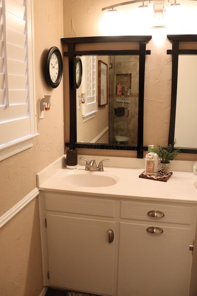 3014 Edgemere Dr, Plainview, TX 79072 - bathroom with vanity and a textured wall
