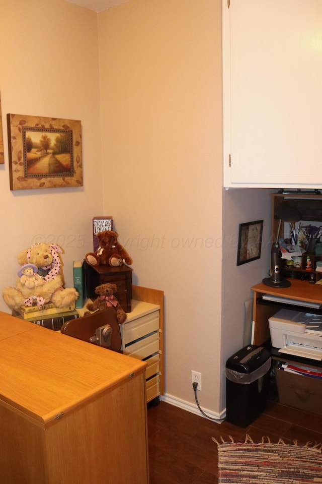 3014 Edgemere Dr, Plainview, TX 79072 - bedroom with baseboards and dark wood-style floors