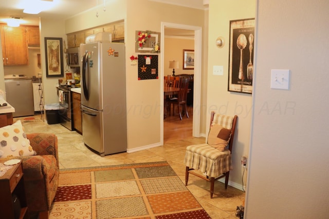 3014 Edgemere Dr, Plainview, TX 79072 - hallway with washer / clothes dryer, baseboards, and light tile patterned floors
